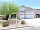 Two-story home with three-car garage and xeriscape landscaping at 733 E Megan Dr, San Tan Valley, AZ 85140