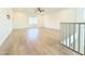 Bright, open living area featuring wood floors and a ceiling fan for added comfort at 733 E Megan Dr, San Tan Valley, AZ 85140