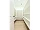 Walk-in pantry featuring ample shelving for organized storage at 733 E Megan Dr, San Tan Valley, AZ 85140