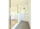 Walk-in shower featuring sleek design, marble tile and contemporary fixtures at 733 E Megan Dr, San Tan Valley, AZ 85140