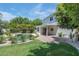 Spacious backyard featuring a pool, patio, and beautiful landscaping at 7348 N 9Th Pl, Phoenix, AZ 85020