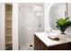 Bright bathroom with a glass shower enclosure, and modern fixtures at 7348 N 9Th Pl, Phoenix, AZ 85020