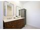 Bathroom features a double vanity and two large mirrors at 7348 N 9Th Pl, Phoenix, AZ 85020