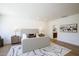 Spacious bedroom featuring wood floors, recessed lighting, and contemporary decor at 7348 N 9Th Pl, Phoenix, AZ 85020