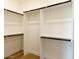 Spacious walk-in closet with custom shelving and ample storage space, perfect for organization at 7348 N 9Th Pl, Phoenix, AZ 85020