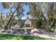 Outdoor living area showcasing a stunning fireplace and cozy seating at 7348 N 9Th Pl, Phoenix, AZ 85020