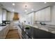 Spacious kitchen with stainless steel appliances, center island, and hardwood flooring at 7348 N 9Th Pl, Phoenix, AZ 85020