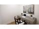 A home office featuring a gray desk, natural light, and modern décor at 7348 N 9Th Pl, Phoenix, AZ 85020