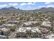 Scenic aerial view of the community with mountain views and lush landscaping at 7601 E Indian Bend Rd # 3030, Scottsdale, AZ 85250