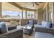 Spacious balcony with stylish outdoor furniture and scenic views of the community and sky at 7601 E Indian Bend Rd # 3030, Scottsdale, AZ 85250