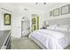 Stylish bedroom with ensuite bathroom and unique mirror adds a touch of luxury at 7601 E Indian Bend Rd # 3030, Scottsdale, AZ 85250
