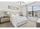Bright main bedroom with neutral tones, plush bedding, and window views at 7601 E Indian Bend Rd # 3030, Scottsdale, AZ 85250