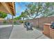 Inviting backyard featuring a private pool, patio, and two Adirondack chairs at 7949 W Wescott Dr, Glendale, AZ 85308