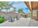 Charming outdoor kitchen with built-in grill, fridge, ample counter space, seating and a tranquil ambiance at 7949 W Wescott Dr, Glendale, AZ 85308