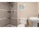 A bathroom featuring a walk-in shower and sink, designed for functionality and style at 8542 N 30Th Dr, Phoenix, AZ 85051