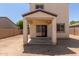 Backyard featuring a covered patio space for outdoor living at 8577 S 253Rd Dr, Buckeye, AZ 85326
