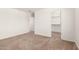 Spacious bedroom with plush carpeting, closet and ensuite bath, perfect for relaxation at 8577 S 253Rd Dr, Buckeye, AZ 85326