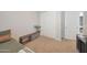 Bright bedroom showcasing neutral walls, closet space, and carpeted floors for comfortable living at 8683 S 165Th Ave, Goodyear, AZ 85338