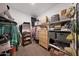 Walk-in closet with shelving, drawers, and hanging storage for organization at 8683 S 165Th Ave, Goodyear, AZ 85338