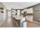Bright and modern kitchen with granite countertops, stainless steel appliances, and large island at 8683 S 165Th Ave, Goodyear, AZ 85338