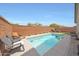 Inviting swimming pool offering a refreshing retreat on a sunny day, perfect for relaxation and recreation at 8683 S 165Th Ave, Goodyear, AZ 85338