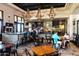 Restaurant and bar area with stylish decor and lively atmosphere at 8683 S 165Th Ave, Goodyear, AZ 85338