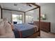 Bright bedroom boasts a private outdoor patio and pool access, providing a relaxing retreat at 8732 E Sandalwood Dr, Scottsdale, AZ 85250