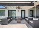 Outdoor living with a lounge area, ceiling fan, and stone pavers at 8732 E Sandalwood Dr, Scottsdale, AZ 85250