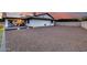 Backyard with a large area covered in gravel, solar panels and a covered patio at 9005 W Villa Chula St, Peoria, AZ 85383