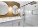 Modern bathroom featuring a double vanity, sleek fixtures, a glass-enclosed shower, and contemporary design, creating a spa-like retreat at 9005 W Villa Chula St, Peoria, AZ 85383