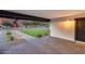 Covered entrance showcases a brick paver walkway, desert landscaping, and classic architectural details at 9005 W Villa Chula St, Peoria, AZ 85383