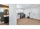 Bright laundry room with stainless steel washer/dryer, white cabinetry, and sleek, modern design, offering both style and function at 9005 W Villa Chula St, Peoria, AZ 85383