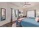 Bedroom with two twin beds, a desk and a window overlooking the street at 10723 N 118Th Way, Scottsdale, AZ 85259