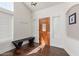Welcoming entryway featuring a decorative front door and bench seating at 10723 N 118Th Way, Scottsdale, AZ 85259