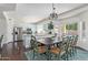 Bright, open kitchen and dining area with pool views at 10723 N 118Th Way, Scottsdale, AZ 85259