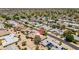 Overhead view of a desert community highlighting well-maintained homes and local street at 12831 W Maplewood Dr, Sun City West, AZ 85375