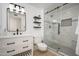 Bathroom features a glass enclosed shower and vanity with shelving at 12831 W Maplewood Dr, Sun City West, AZ 85375