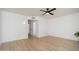 Bedroom features wood floors, a ceiling fan, and natural lighting at 12831 W Maplewood Dr, Sun City West, AZ 85375