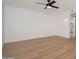 Bedroom with wood floors, ceiling fan, and recessed lighting at 12831 W Maplewood Dr, Sun City West, AZ 85375
