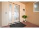 Inviting front entrance featuring a decorative glass door and neutral-toned exterior at 12831 W Maplewood Dr, Sun City West, AZ 85375