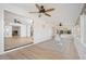 Bright and airy floorplan seamlessly connects to the sun room, creating an open space at 12831 W Maplewood Dr, Sun City West, AZ 85375