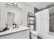 Clean, bright bathroom with modern fixtures, including a sleek vanity and tiled shower at 1320 E Scott Ave, Gilbert, AZ 85234