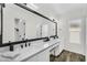 Bathroom boasting a double vanity with a large mirror and ample lighting at 1320 E Scott Ave, Gilbert, AZ 85234