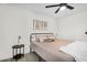 Bedroom featuring a queen bed with a decorative side table at 1320 E Scott Ave, Gilbert, AZ 85234