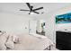 Bedroom featuring a bed, television, and access to a walk in closet at 1320 E Scott Ave, Gilbert, AZ 85234