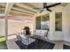 Outdoor patio with comfortable seating and ceiling fans creates a relaxing entertainment space at 1320 E Scott Ave, Gilbert, AZ 85234