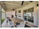 Covered patio features an outdoor dining set and furniture, perfect for enjoying meals outside at 1320 E Scott Ave, Gilbert, AZ 85234