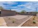 Large backyard with gravel and paver patio, ready for entertaining and relaxation at 1322 W Flower St, Phoenix, AZ 85013