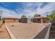 Large backyard with gravel and paver patio, ready for entertaining and relaxation at 1322 W Flower St, Phoenix, AZ 85013