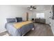 Relaxing bedroom with neutral decor, dresser, and wood-look tile flooring at 1322 W Flower St, Phoenix, AZ 85013